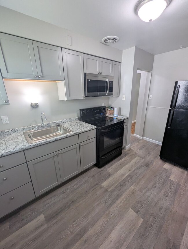 Primary Photo - Charming Corner-Lot Home with Modern Upgra...