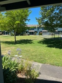 Building Photo - Spacious Condo with Private Patio