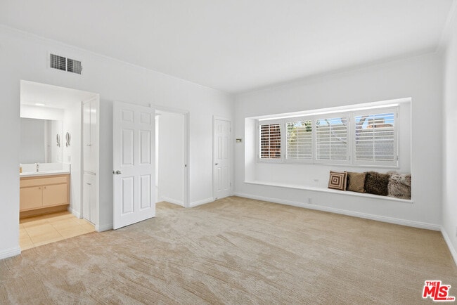 Building Photo - 13326 Maxella Ave