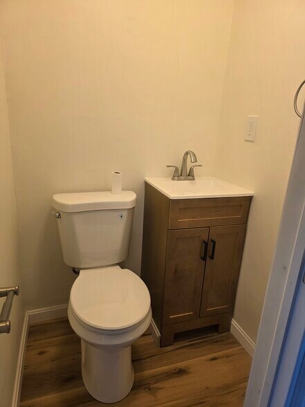 Basement 1/2 bath- all brand new and flooring - 1718 Judy Way