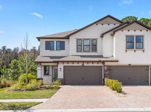 Building Photo - "Estancia 3-Bed Sanctuary with Granite Finishes and Scenic Views in Wesley Chapel"