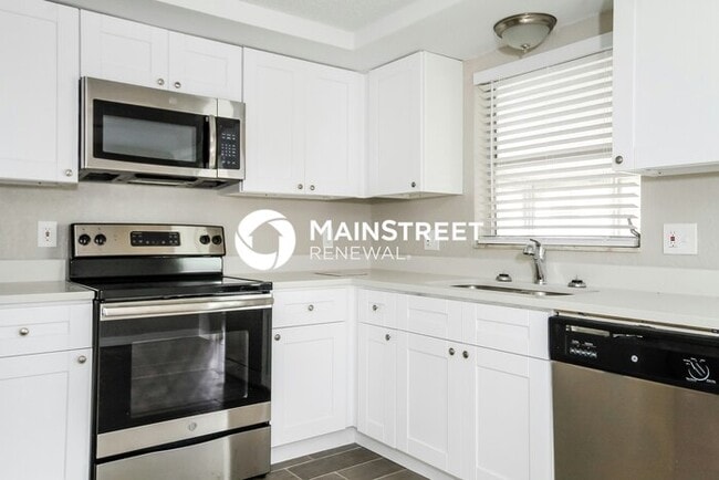 Building Photo - 3 Bedroom Pet-Friendly Home in Port Richey, FL with Main Street Renewal