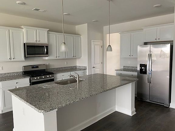 Building Photo - 5025 Magnolia Village Way