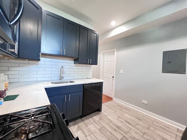 Building Photo - 6402 S Eberhart Ave