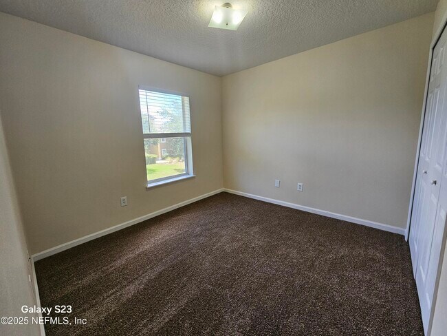 Building Photo - 6965 Ortega Woods Dr