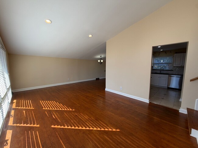 Building Photo - Freshly Painted Split-Level Home with Large Deck & Lawn Care Included