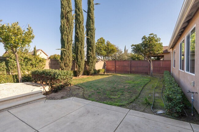 Building Photo - Harlan Ranch Home with Yard for Lease