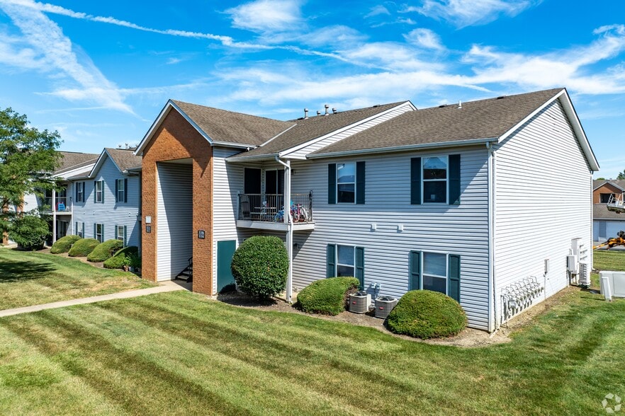 Dooley's Orchard apartment building showing, showing the two-floor exterior. - Dooley's Orchard