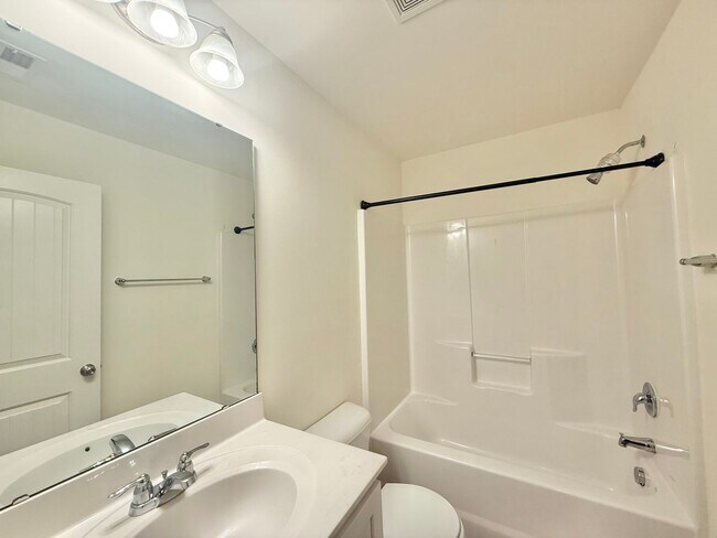 Building Photo - Spacious 3BD, 3.5BA Clayton Townhome with a Large Bonus Space Downstairs and Easy Access to Highways