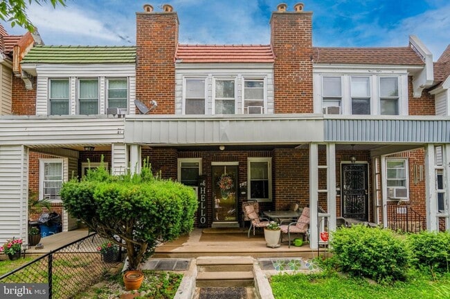 Building Photo - 7117 Woolston Ave