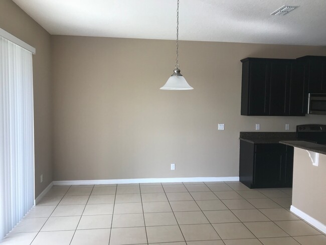 Building Photo - 4 BED HOME IN APOPKA!!! GATED COMMUNITY!!!...