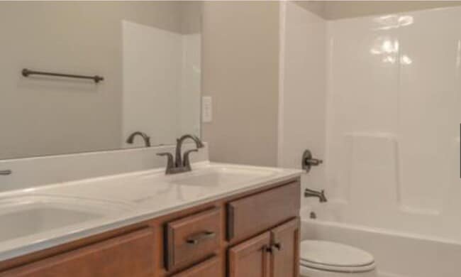 Building Photo - NEW LISTING- 4 bd/ 2.5 ba located MINUTES ...