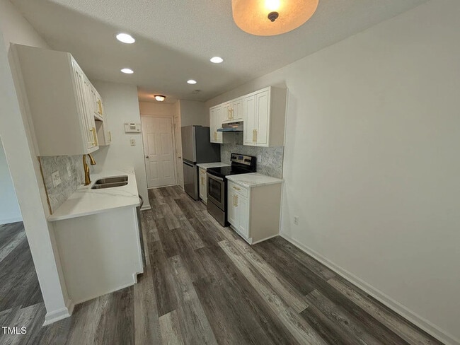 Building Photo - Earn Wealth While Leasing - Like a Homeown...
