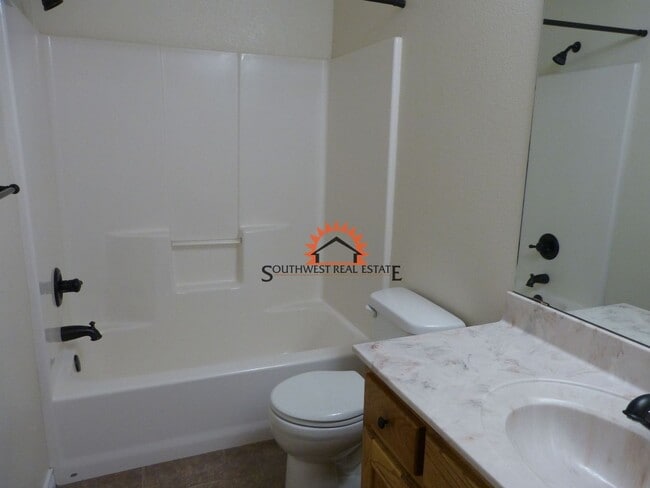 Building Photo - Stunning 4 bedroom 3 bath brick home with 5 car garage!