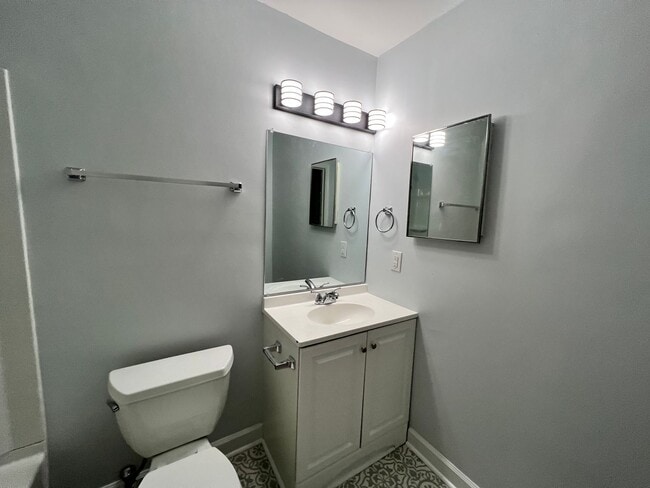 Building Photo - Three-bedroom, two-and-a-half bathrooms in...