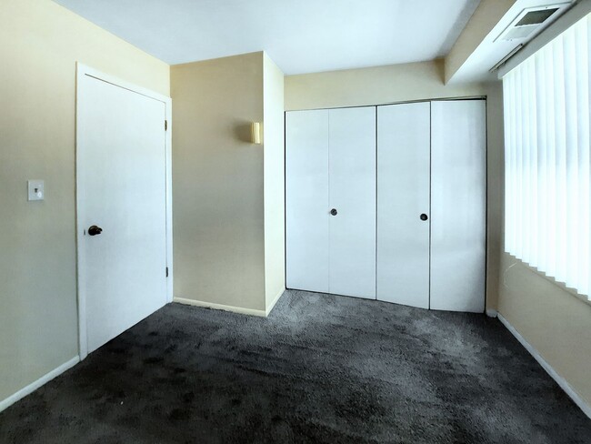 Building Photo - **Spacious 3BR/1BA Condo – Move-In Special...
