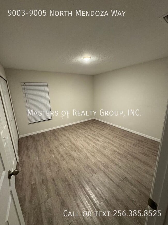 Building Photo - 9003-9005 North Mendoza Way-