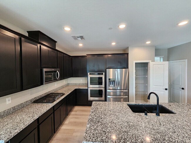 Building Photo - Upgraded 3-Bedroom with a Pool in a Gated Community