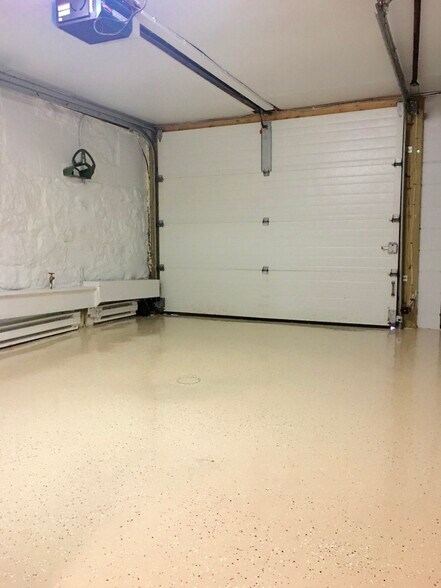 Attached Garage entrance into apartment - 707 College Ave