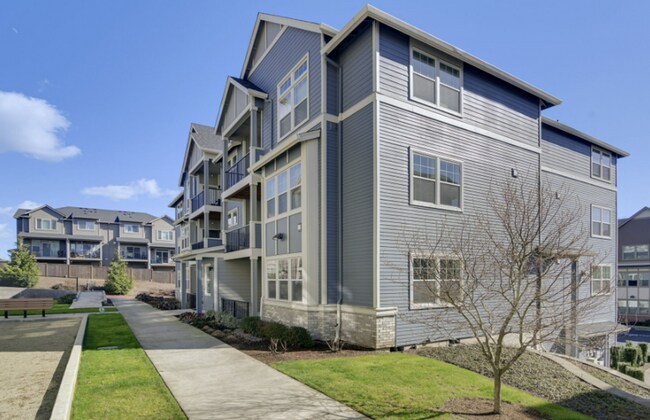 Building Photo - Modern Ground-Level Condo in River Terrace...