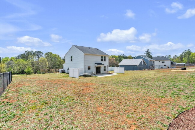 Building Photo - Stunning 3BR/2.5BA Home | Private Fenced Yard & Outdoor Oasis $2190/mo rent