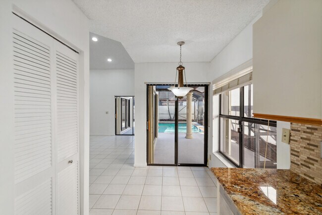 Building Photo - 7842 Villa Nova Dr N