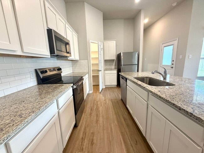 Building Photo - Amanda Park Duplex 3/2 off Potranco