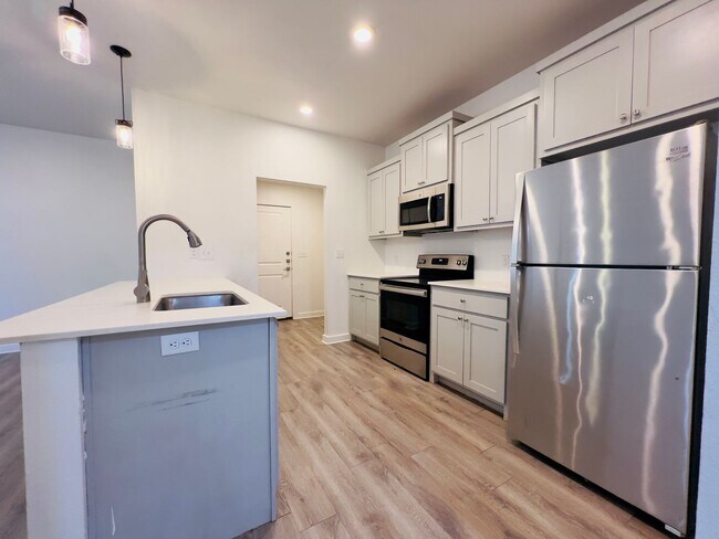 Building Photo - PRE-LEASING FOR JULY! Spacious 3-Bedroom Townhouse Near Texas Tech