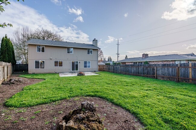 Building Photo - Recently Updated with Wood Laminate Flooring and Fresh Paint