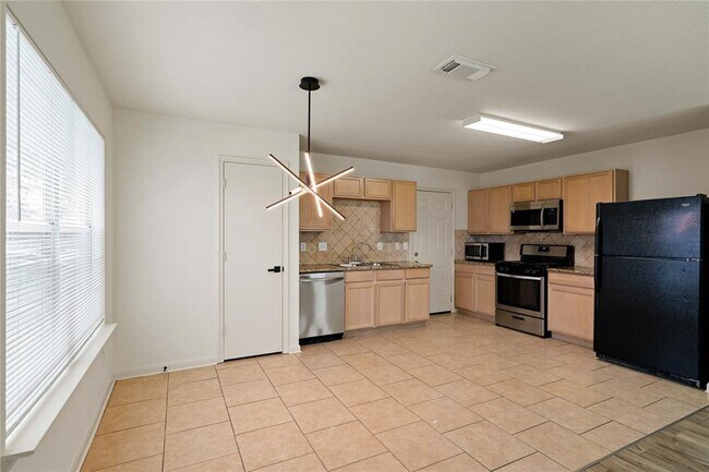 Building Photo - 6942 Shining Sumac Ave