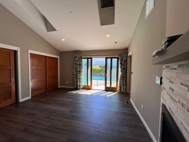 Building Photo - Spacious 4-Bedroom Retreat Just Steps from...