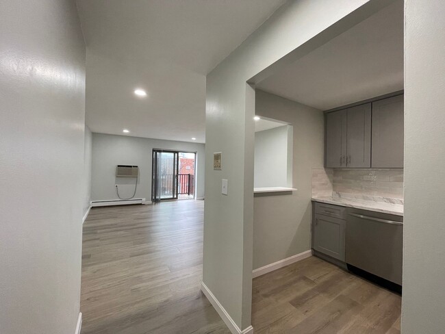 Building Photo - Renovated 2-Bedroom Condo with Balcony, Po...