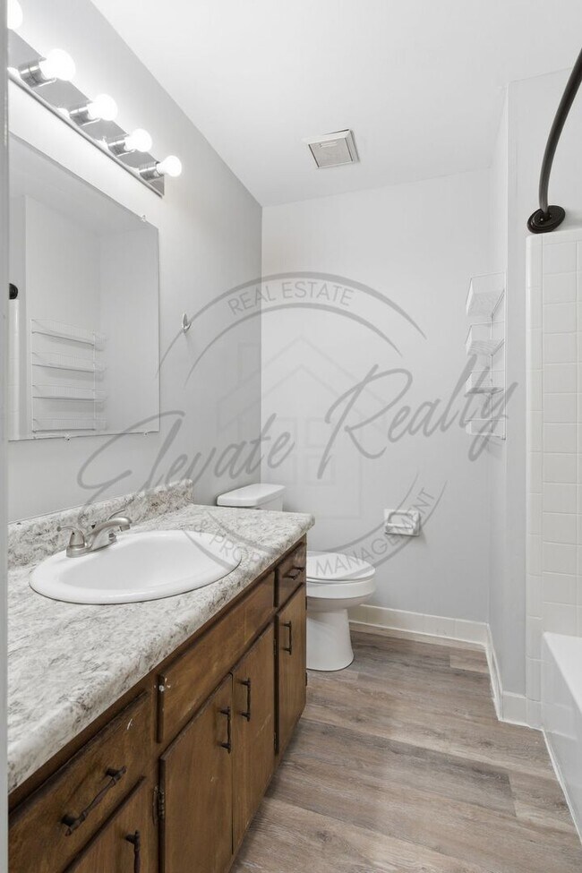 Building Photo - SPRING SPECIAL!! FIRST MONTH FREE on this Two Bedroom Condo, Garden Level with Washer/Dryer Hook ...