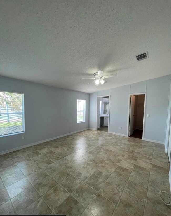 Building Photo - 8179 Sandwedge Terrace