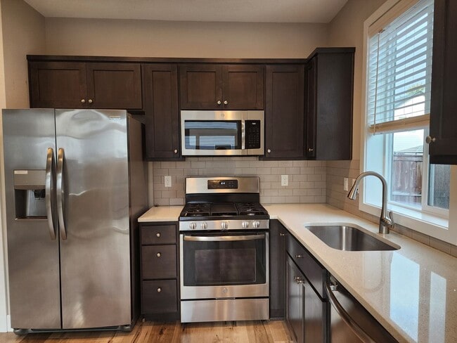 Building Photo - $1,000.00 OFF YOUR FIRST FULL MONTH'S RENT...