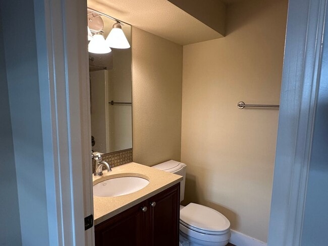 Building Photo - Stunning Tri-Level Condo with Open Concept Layout, Loft, and Private Patio!