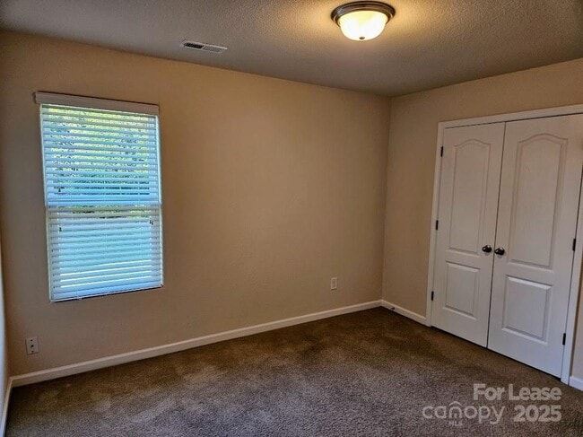 Building Photo - 8119 Paw Club Dr