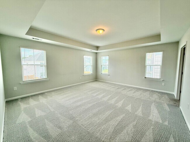 Building Photo - Stunning New 5BD, 5BA Garner Home with Lux...