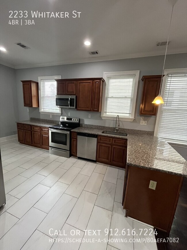 Building Photo - "Spacious 4-Bed, 3-Bath Duplex with Granit...