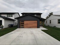 Building Photo - Modern 3-Bedroom Home Near Lake Manawa – Lake Views & Smart Home Features!