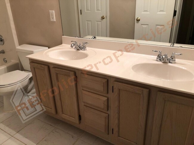 Building Photo - Elegant 4 Bedroom 2.5 Bath House w/ Primary Suite on 1st Floor + a Fenced-in Backyard @ Park Vill...