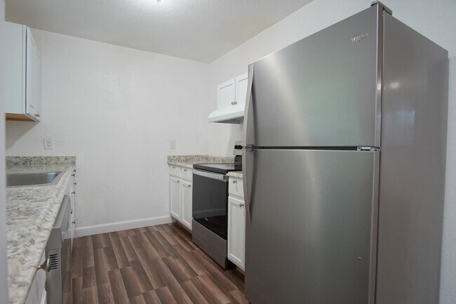 Building Photo - 4BR Home with LVP Flooring, Open Layout & Large Backyard Near Dogwood