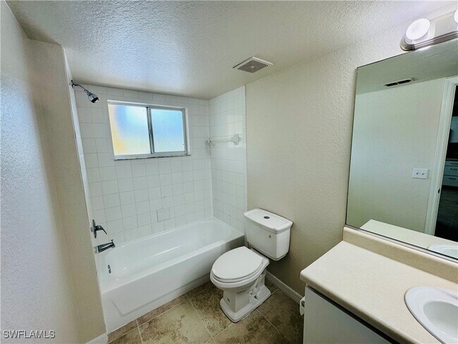 Building Photo - 8304 Key Royal Cir