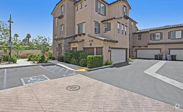 Building Photo - This gorgeous 3-bedroom, 3.5 bath townhome...