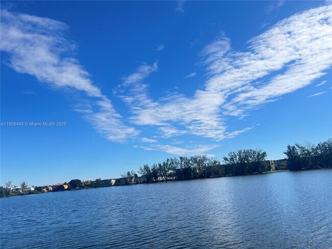 Building Photo - 9911 W Okeechobee Rd