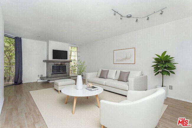 Building Photo - 1230 N Sweetzer Ave