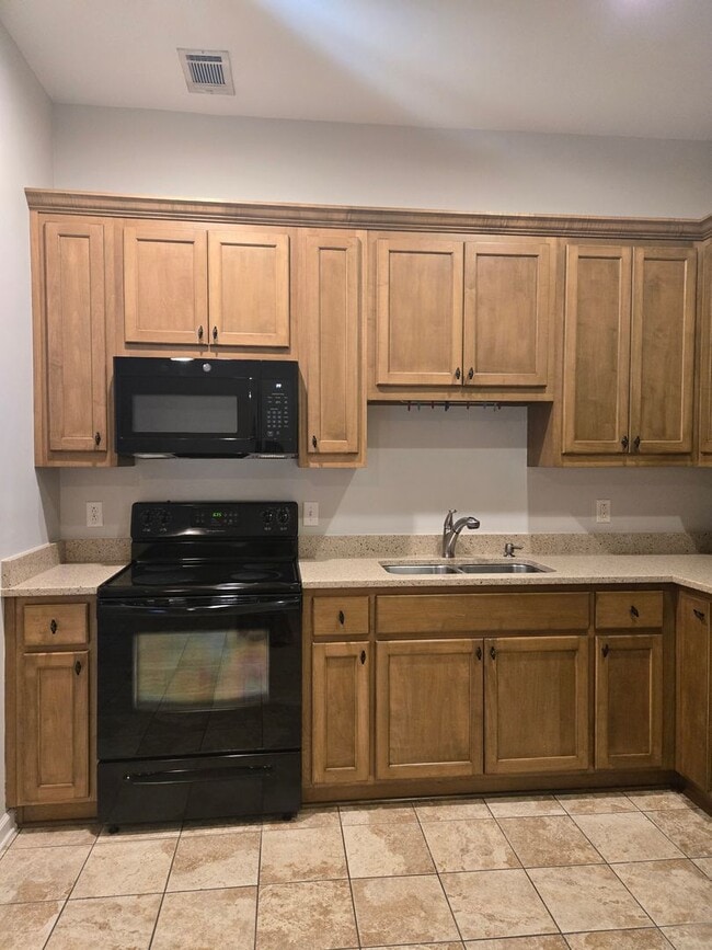 Building Photo - Sophisticated 2-Bedroom Retreat Featuring Soaring Ceilings & Modern Comforts