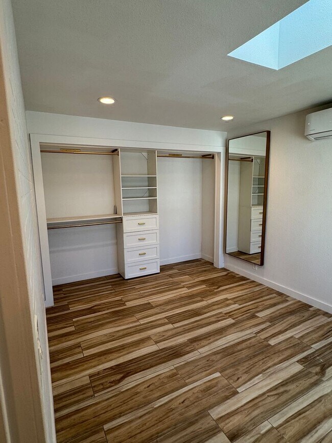 Building Photo - !! MOVE-IN SPECIAL !! Cozy Carson Back House with Skylights & Washer/Dryer