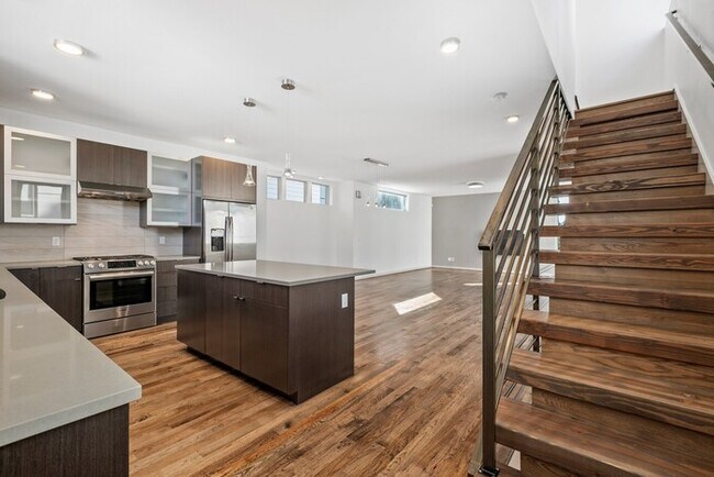 Building Photo - Impeccable Greenwood Townhome with Air Con...