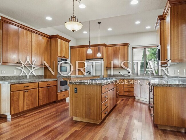 Building Photo - Elevated Forest Heights Retreat with Stunning Valley Views & Versatile Living Spaces